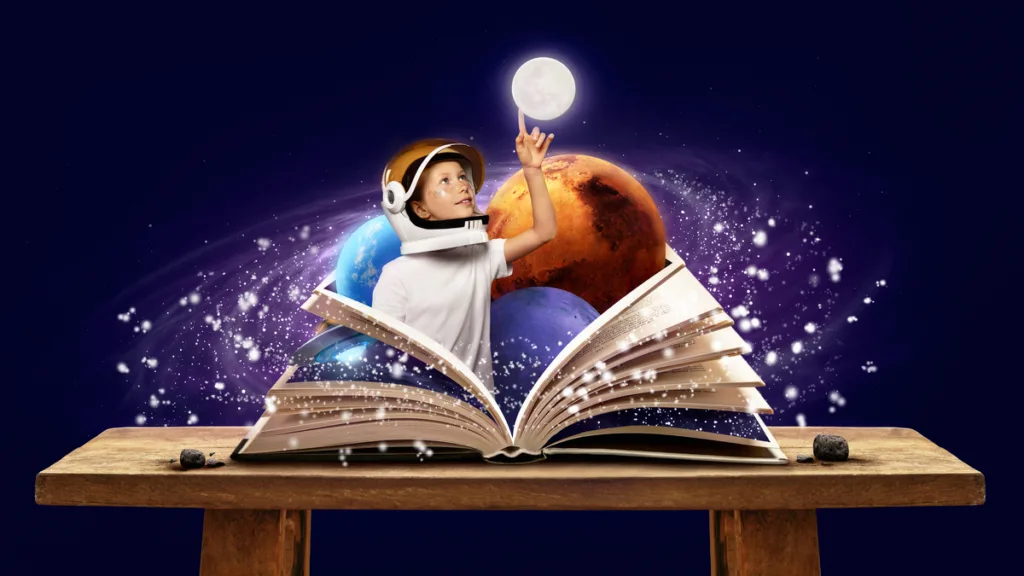 Child in an astronaut suit pointing to the moon while being surrounded by lights and planets coming out of a book